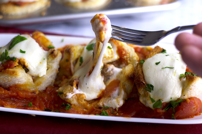 Eating-Meatball-Parm-in-Garlic-Bread